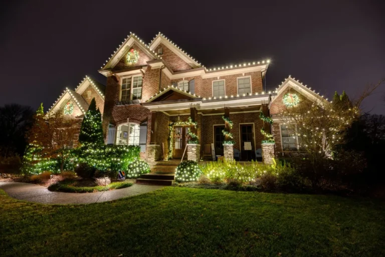 Professional holiday lighting along the roofline of a Middle Tennessee home