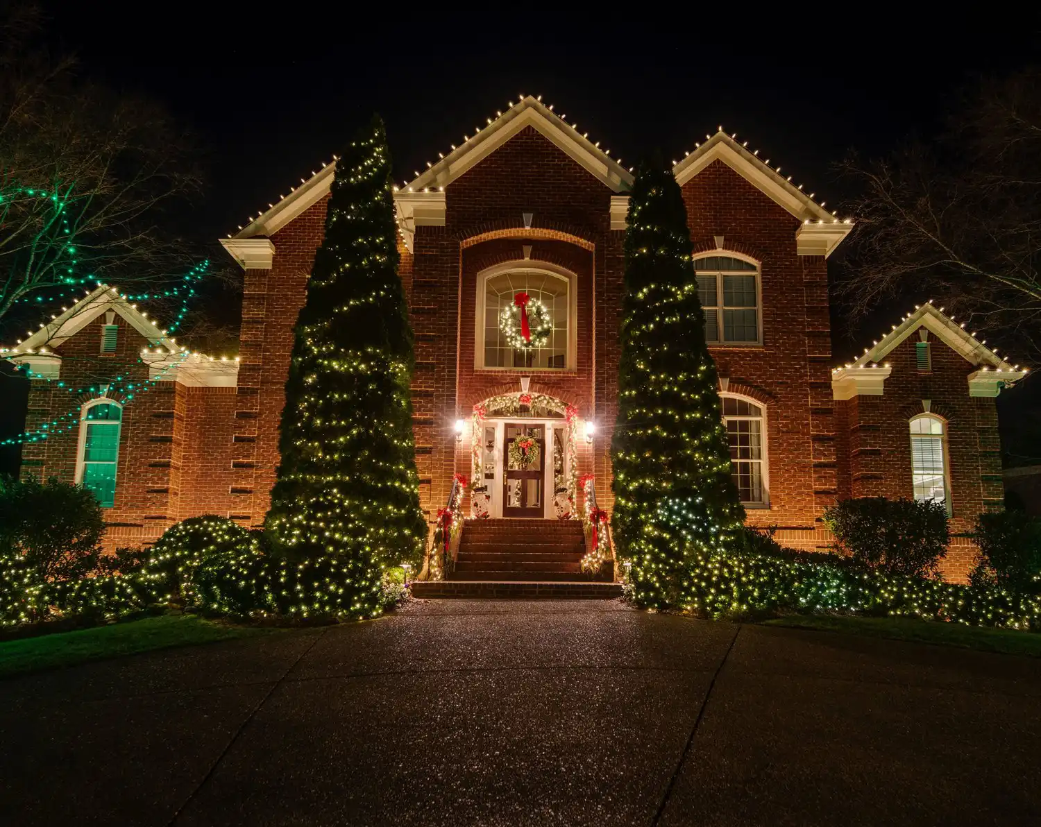 Christmas lighting by Red Nose Lites near 12 South