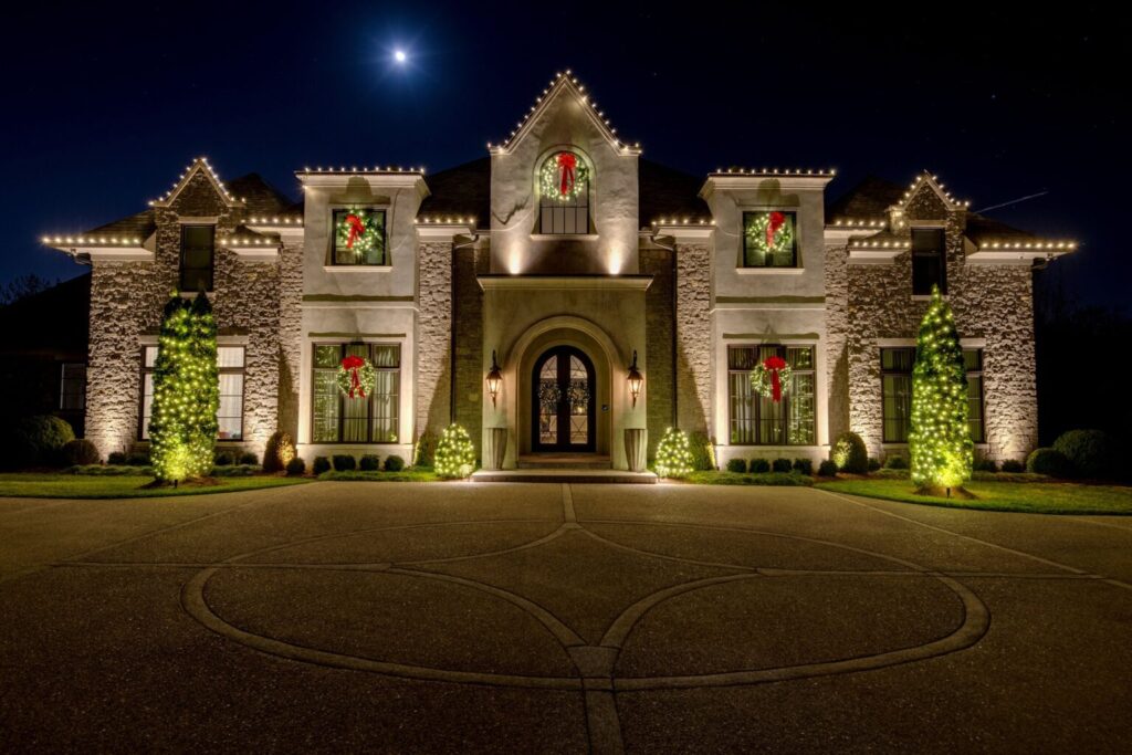 Custom-cut Christmas lights on a two-story Nashville area home