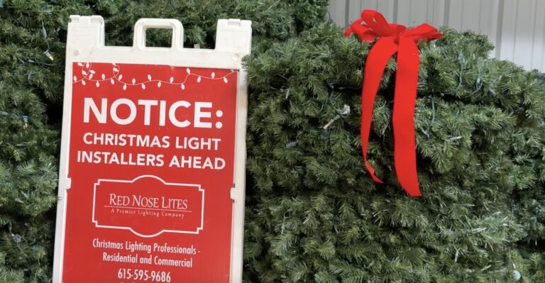 Custom-cut Christmas lights on a two-story Nashville area home