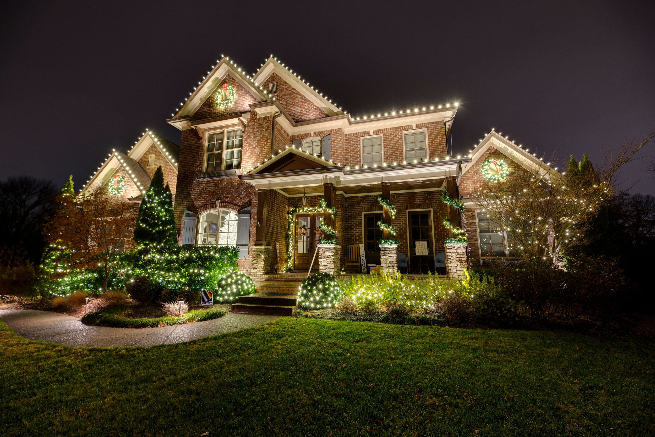 Christmas lighting by Red Nose Lites near 12 South