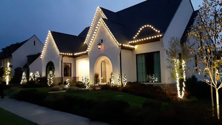 Christmas light installation in Sylvan Park